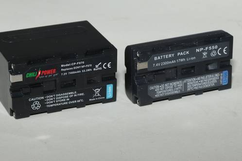 Two different models of NP-F batterycopies. An NP-F970 to the left and an NP-F550 to the right