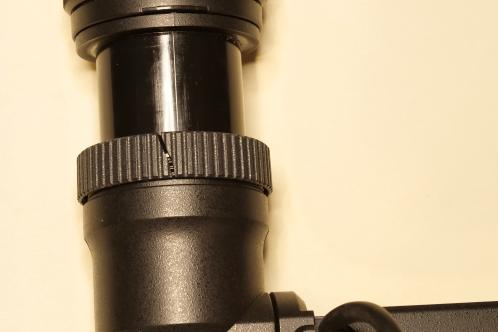The viewfinder of a JVC GY-HM750 videocamera with a crack in the lock ring
