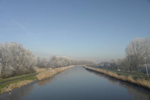 Vergezicht vanaf fietsbrug tussen Purmer- en Kogerdijk